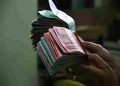 Perlukah Uang Baru untuk THR Lebaran? Ini Makna, Tradisi, dan Pertimbangannya